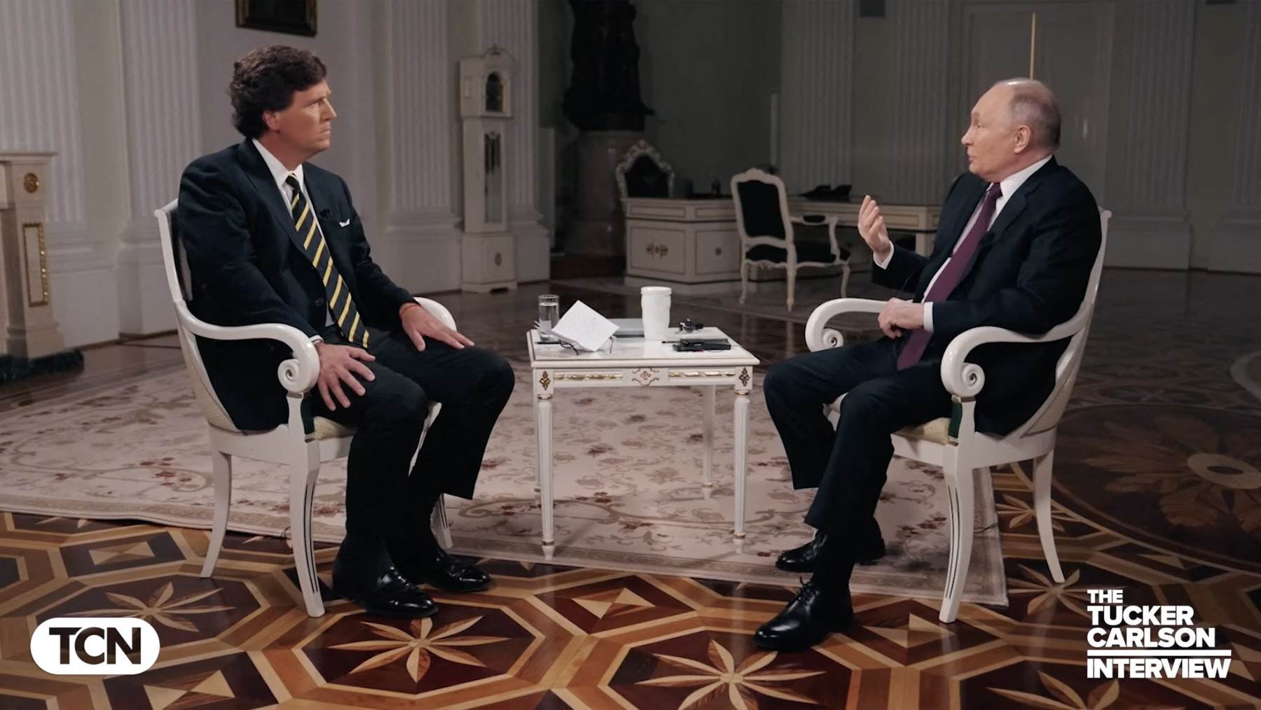 Tucker Carlson i Vladimir Putin Tucker Carlson i Vladimir Putin